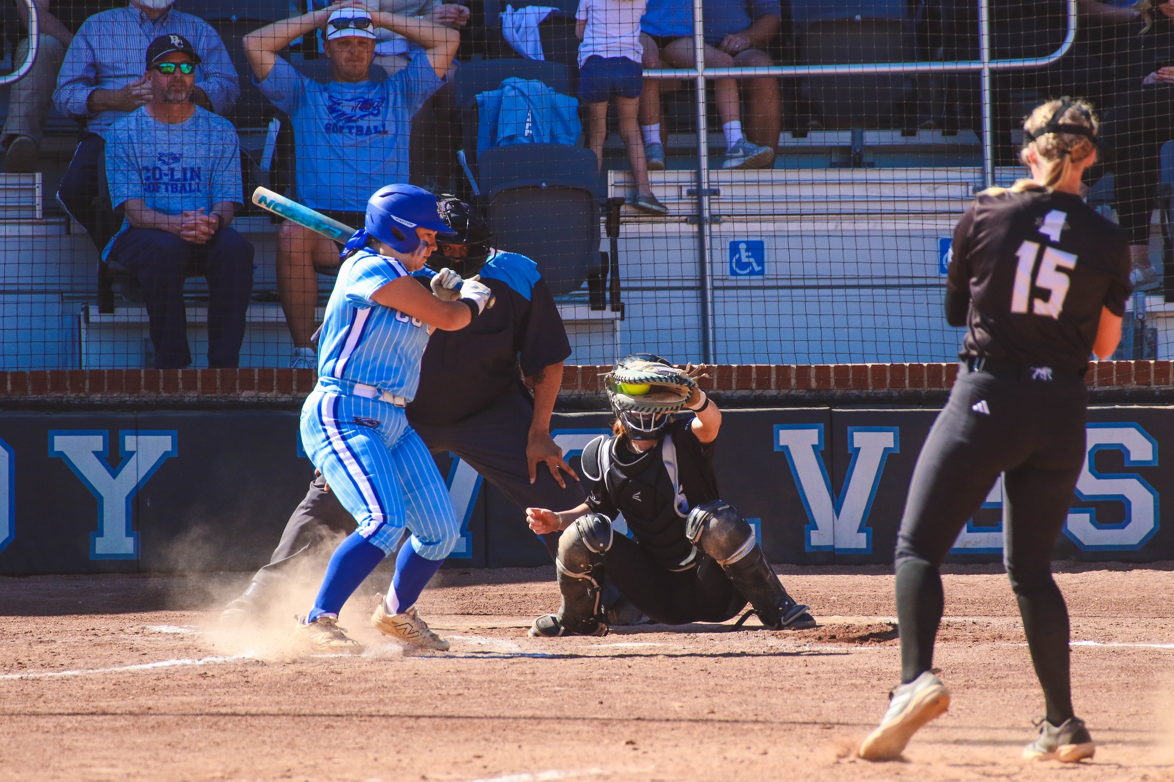 Lady Wolves Split Road Doubleheader